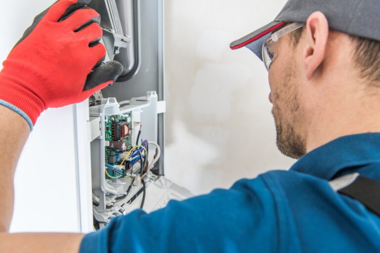 A professional technician installing Furnace system